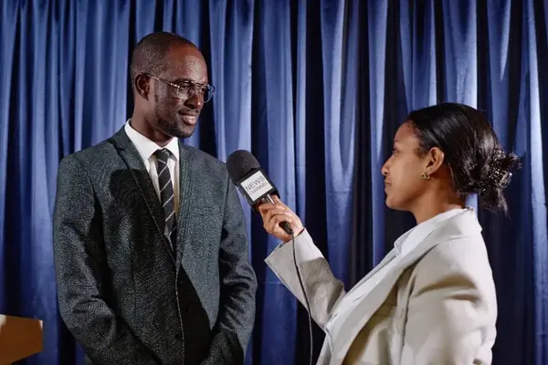 Businessman being interviewed by a journalist